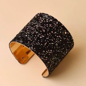 Bland and gold cuff bracelet